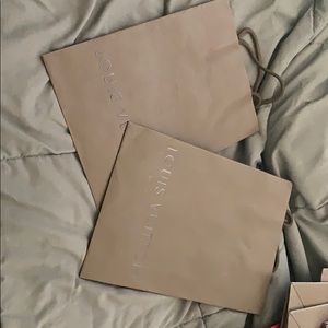 Authentic Louis Vuitton shopping bags
